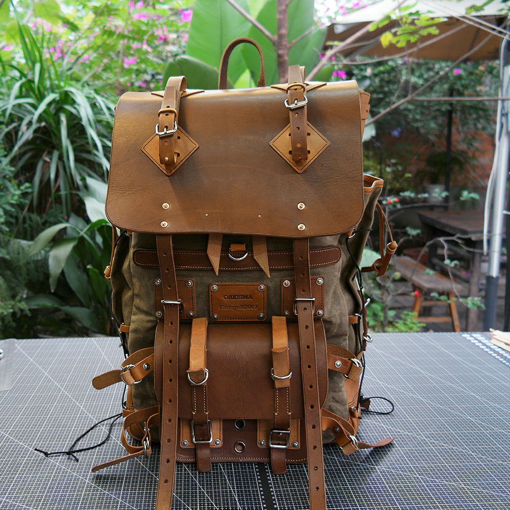 Waxed canvas and leather backpack 45 liter handmade leather waxed backpack, suitable for travel, camping, hunting, hiking