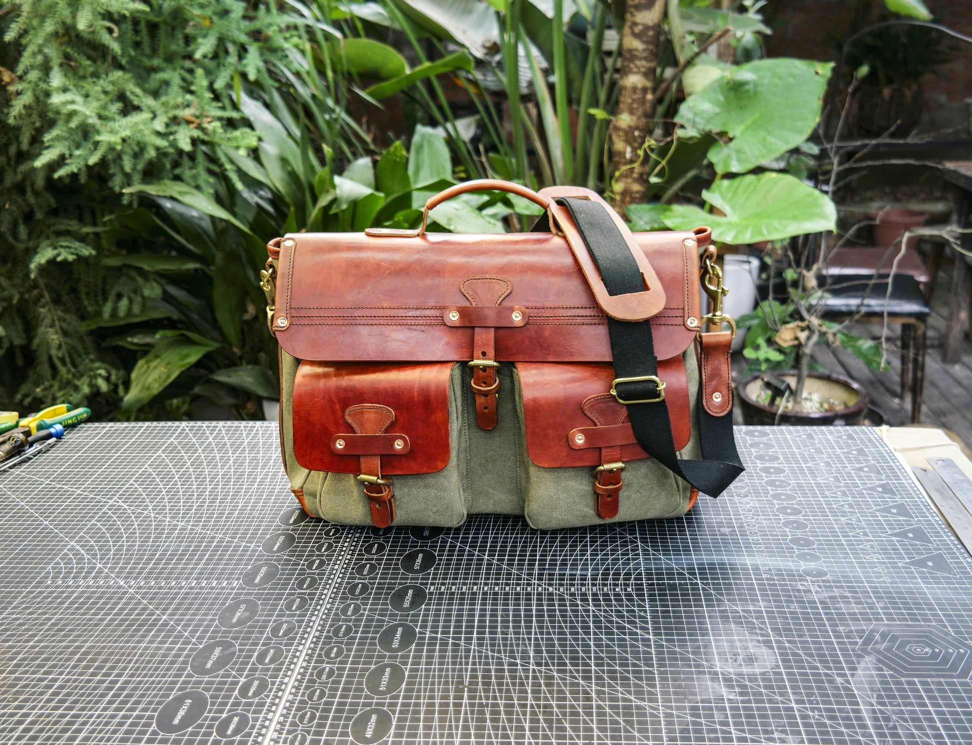 Hand dyed vegetable tanned cowhide canvas messenger bag, crossbody bag